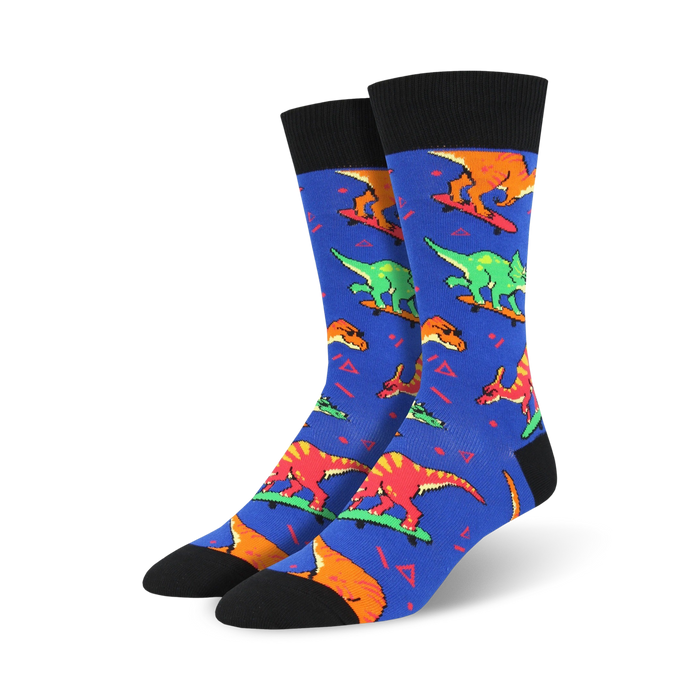 blue crew socks featuring multi-colored dinosaurs skateboarding.    }}