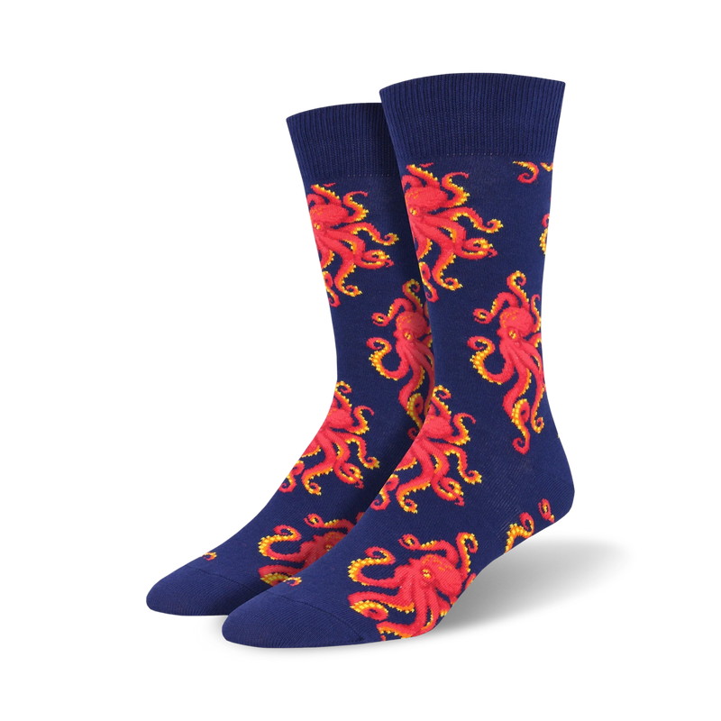 Pair of crew socks with a navy blue background and repeating red octopus designs. Fun and playful!