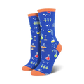 A pair of women's crew socks in royal blue with colorful science illustrations: beakers, test tubes, and atoms. The socks have a burnt orange cuff.