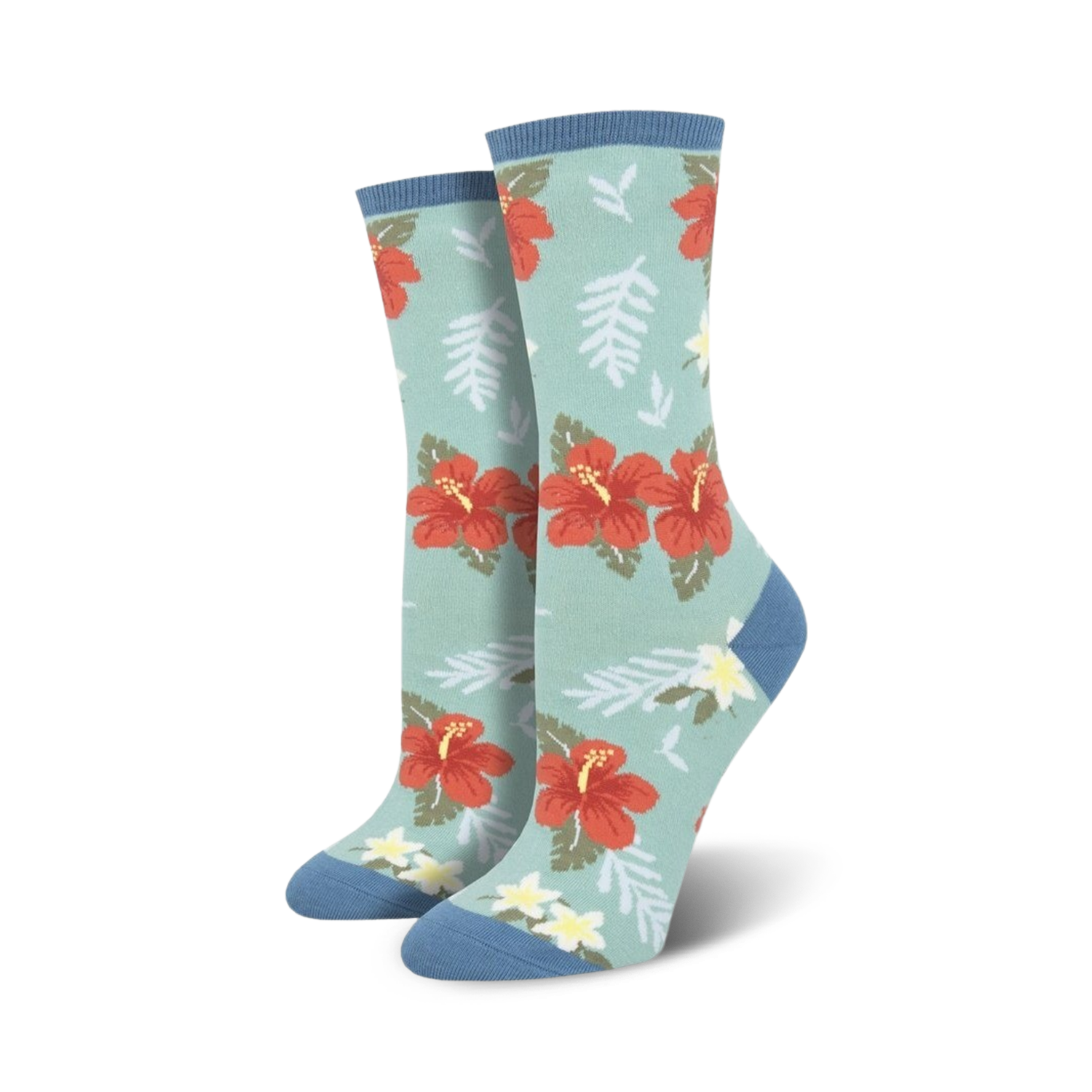 Close-up showing the detail of the red hibiscus flower and green leaf design on a teal crew sock.