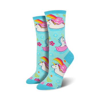 light blue crew socks for women with care bears and unicorns swimming on innertube floats, and rainbows.  