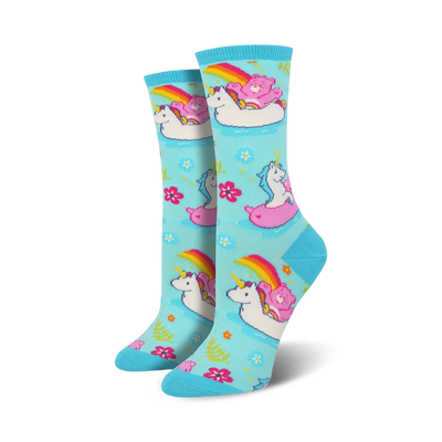 light blue crew socks for women with care bears and unicorns swimming on innertube floats, and rainbows.  