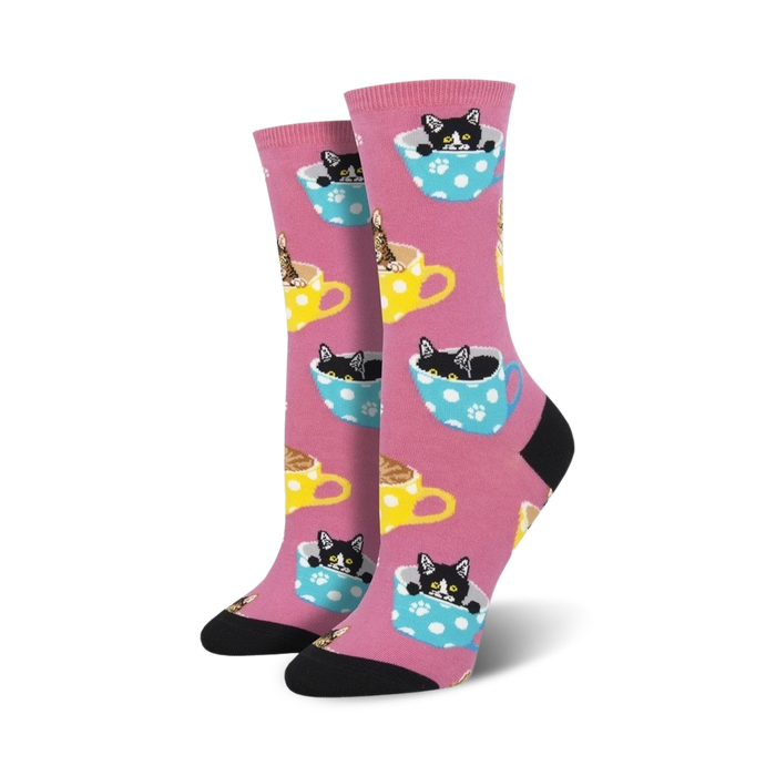 crew socks in pink with cartoon cats sitting in polka dot teacups.   
