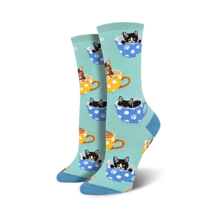 light blue crew socks with cartoon cats in teacups. women's. fun, perfect for coffee lovers.   