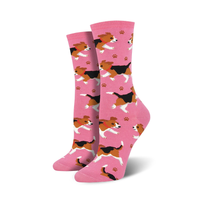 pink crew socks with a pattern of cartoon beagles wearing red collars. scattered black paw prints.  