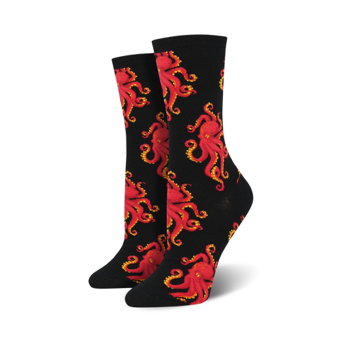 Pair of crew socks with a red octopus pattern on a black background. 