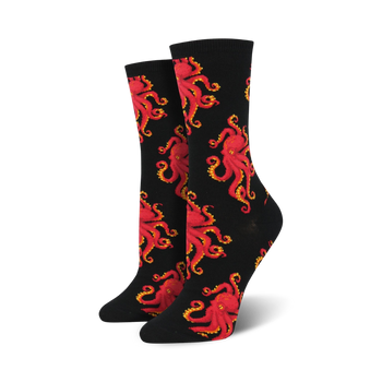 black crew socks covered in an allover pattern of red octopuses with yellow eyes and orange suckers. 