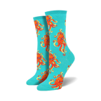 Pair of teal crew socks with a red octopus pattern. 