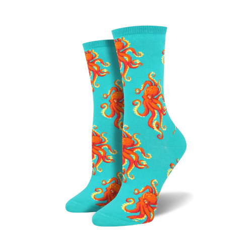 Pair of teal crew socks with a red octopus pattern. 