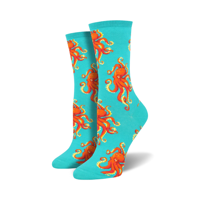 bright turquoise blue crew socks with all-over pattern of orange octopuses.   