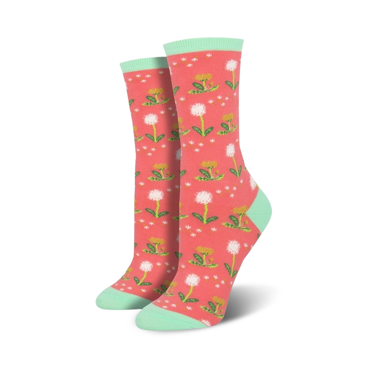 Lifestyle shot showing the coral-colored 'Wishes In The Wind' socks with mint cuffs.