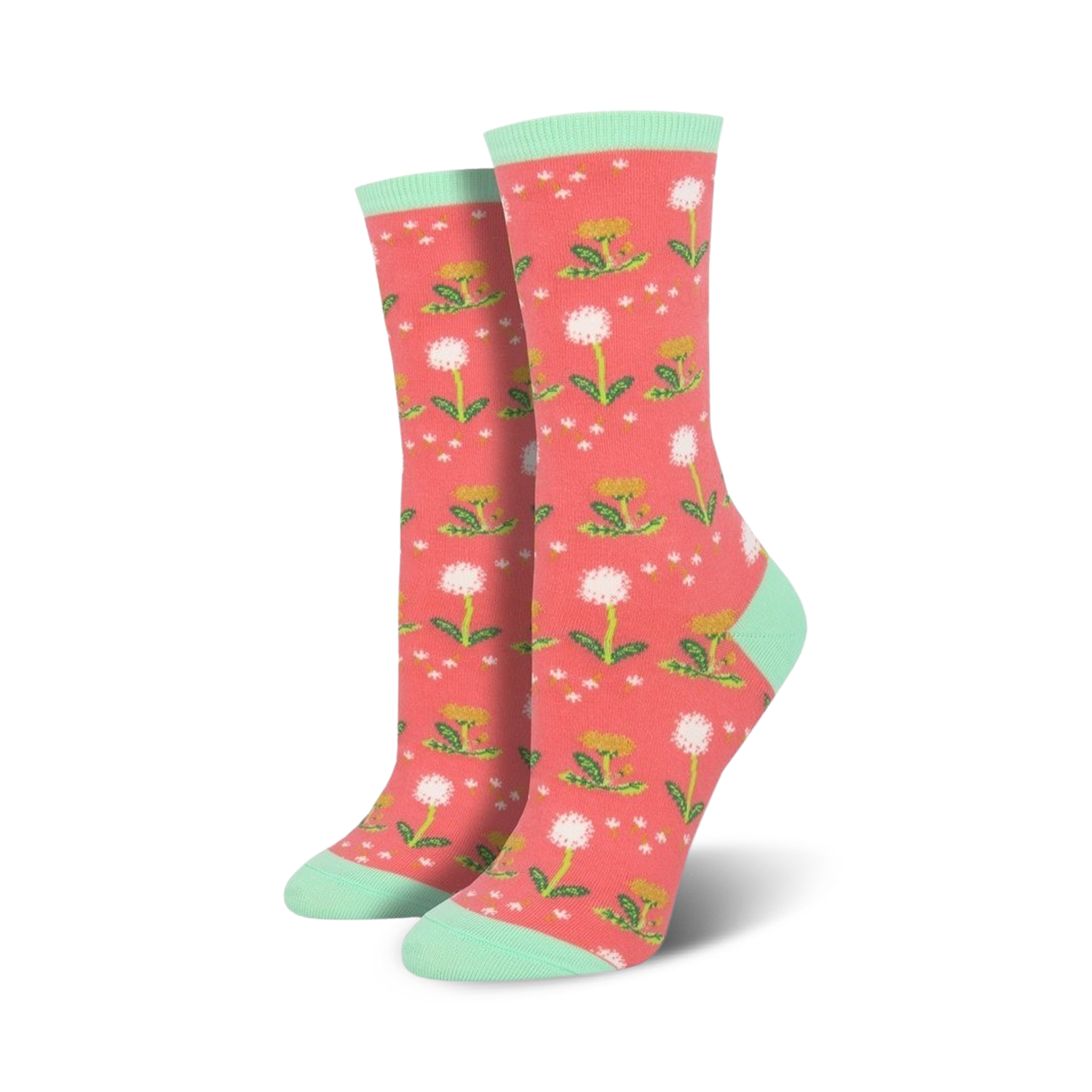 Lifestyle shot showing the coral-colored 'Wishes In The Wind' socks with mint cuffs.