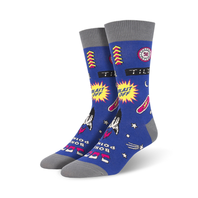 blue crew socks with rockets, stars, and "blast off" and "tilt" patterns. gray toes and heels.  