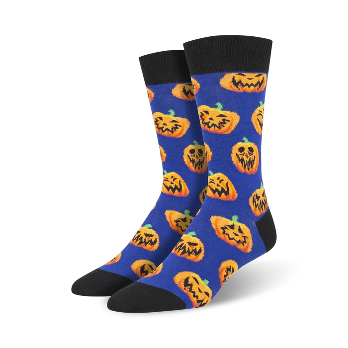 mens crew socks feature all-over pattern with cartoon pumpkin faces with various expressions.  