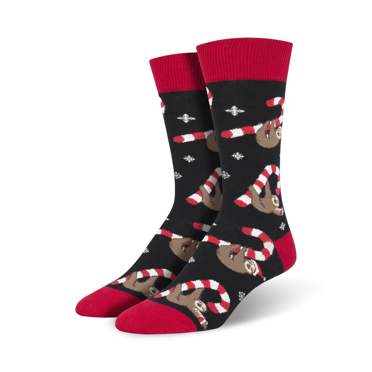 Lifestyle photo showing the Merry Slothmas socks on a person's feet, showcasing the overall look in a casual setting.