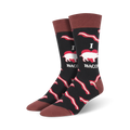 Lifestyle shot showing the black 'Mmm Bacon' socks on a person's feet, demonstrating how the socks look when worn.