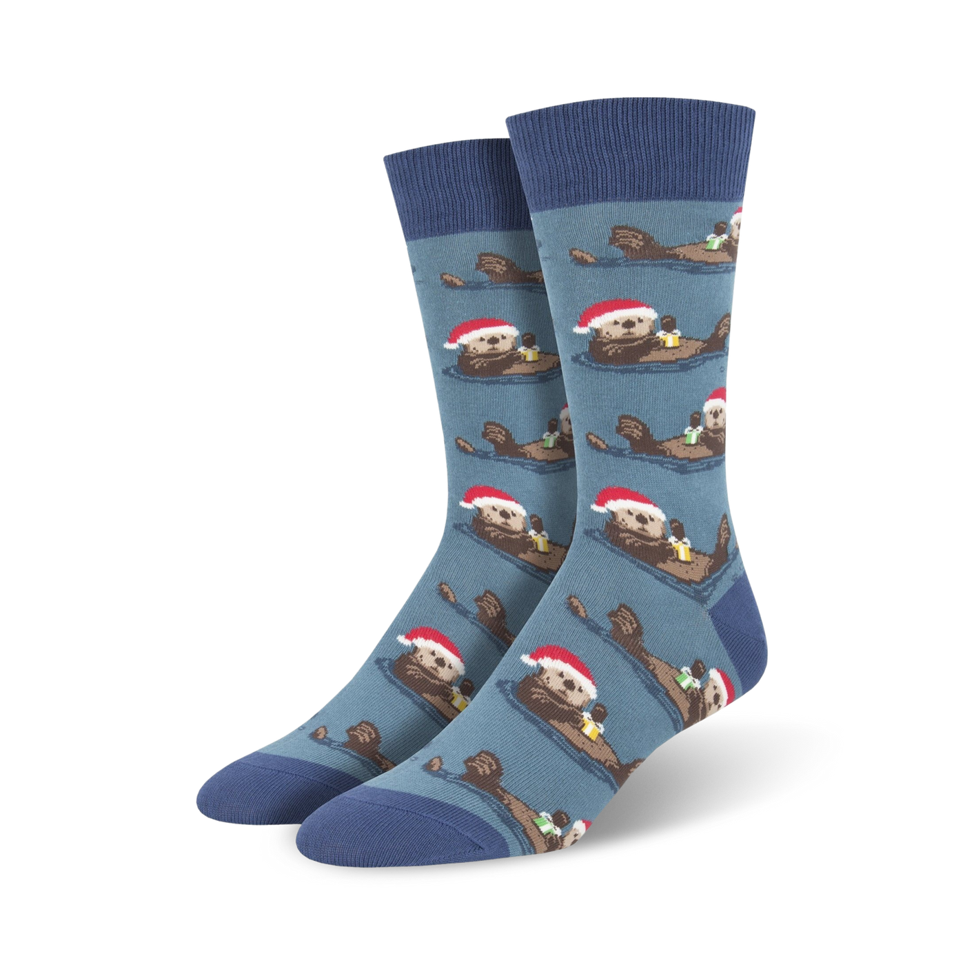 Crew socks in blue and green, featuring a repeating pattern of otters wearing Santa hats and holding presents.