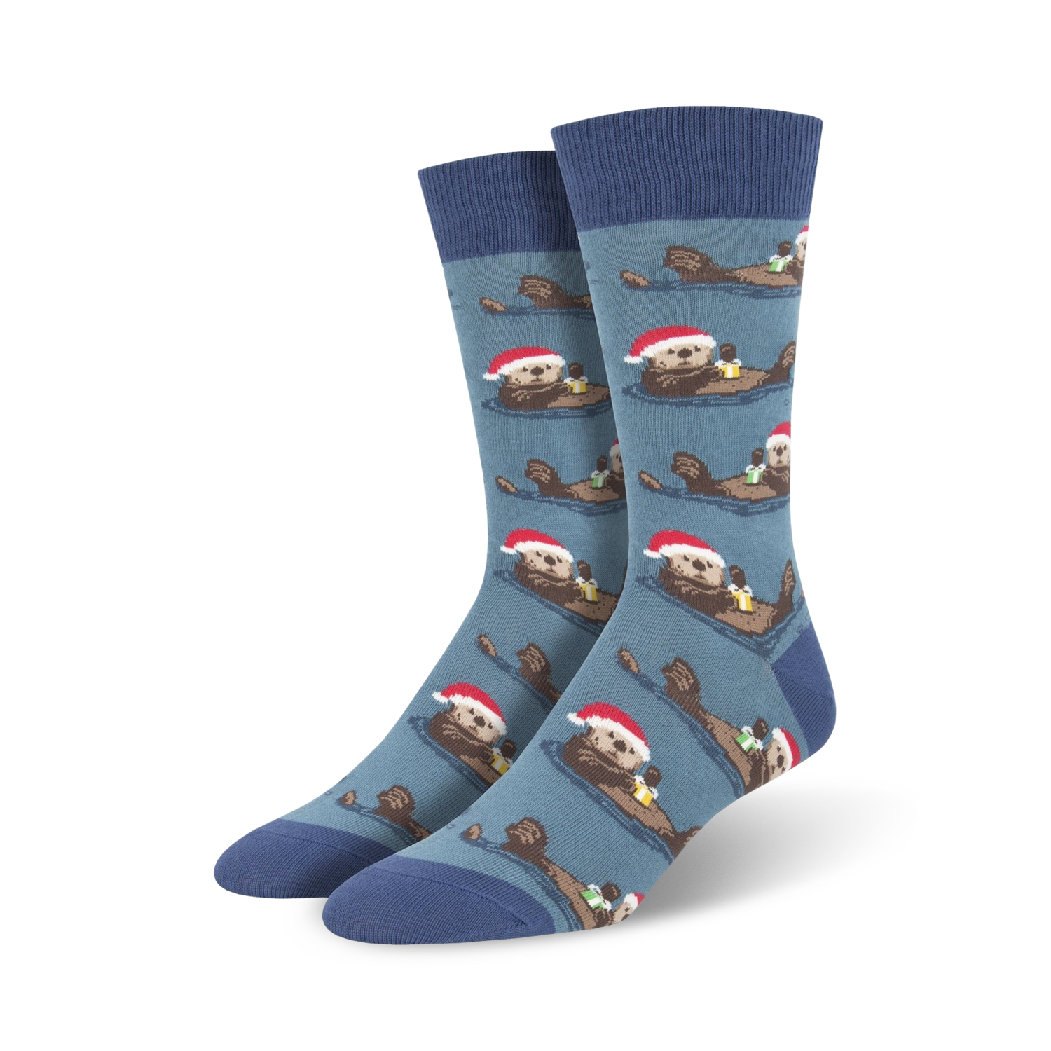 Crew socks in blue and green, featuring a repeating pattern of otters wearing Santa hats and holding presents.