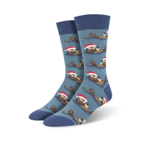 blue crew socks with cartoon otters wearing santa hats and holding presents, perfect for men's christmas attire.  