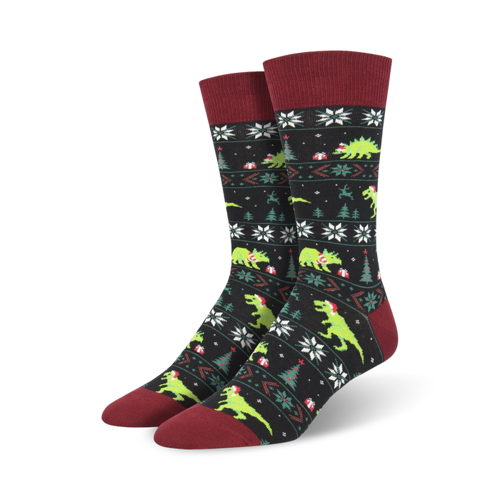 men's santasaurus rex crew socks: black with green dinosaurs wearing santa hats, carrying presents, and red top with white snow flakes   