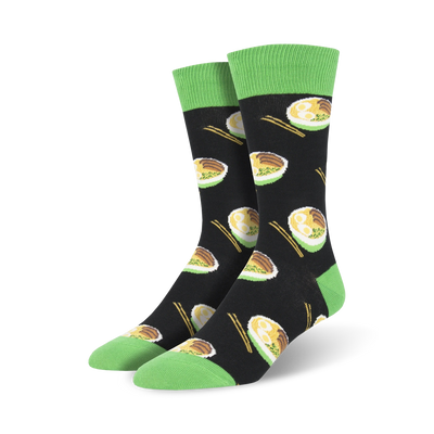 black crew socks with pattern of steaming noodle bowls in yellow, brown, and white. green toe, heel, and chopsticks. for men