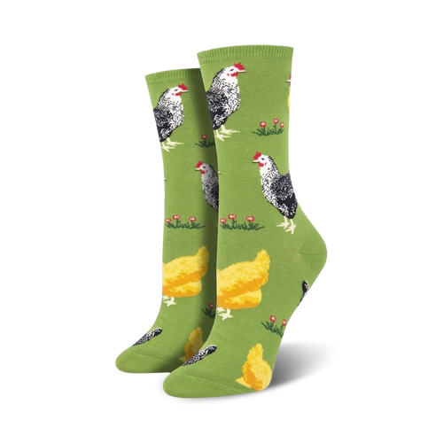 Pair of women's crew socks, green and blue options, featuring a repeating pattern of black and white chickens and yellow chicks on a grassy field.