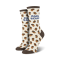 Pair of cream crew socks with a repeating pattern of brown beans wearing sunglasses.  Text 'Cool Beans' is featured on the socks.