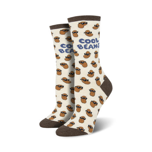 Pair of cream crew socks with a repeating pattern of brown beans wearing sunglasses.  Text 'Cool Beans' is featured on the socks.