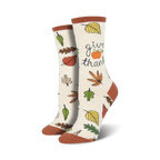 Cream-colored crew socks with autumn leaves, a small pumpkin, and the text 'Give Thanks'.