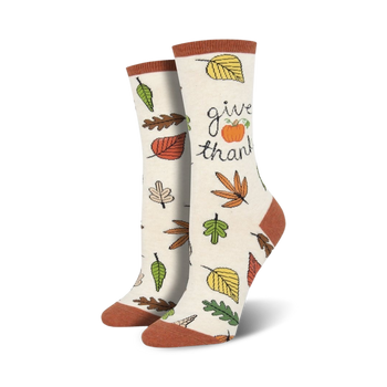 white crew socks with colorful fall leaves and pumpkins, perfect for thanksgiving.  