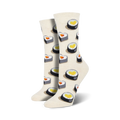 Close-up view of a pair of cream-colored 'Love At First Bite' socks, showcasing the heart-shaped sushi detail.