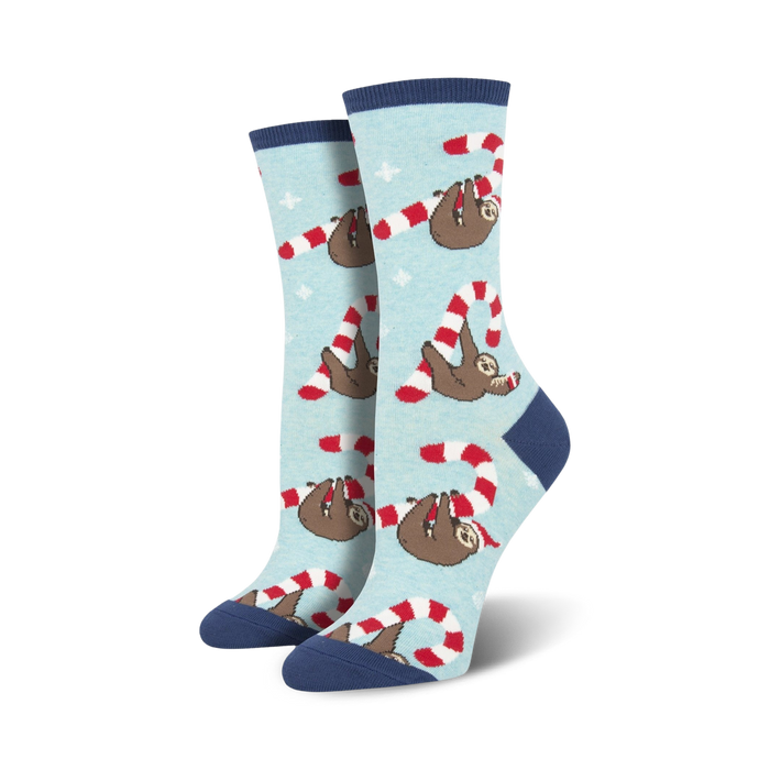  women's merry slothmas crew socks with blue and white sloths in santa hats.   