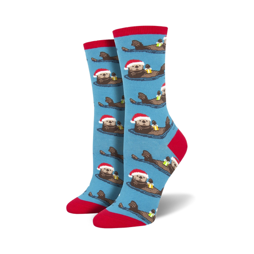 Lifestyle shot showing the blue 'Otterly Merry' socks on a model's feet.