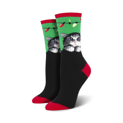 black crew socks with green cuffs and red toes/heels feature gray cat with white paws and pink nose peering through a hole in the fabric.  