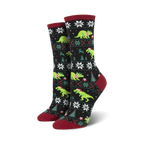 Crew socks in black and green featuring a Fair Isle pattern with T-Rex dinosaurs wearing Santa hats.