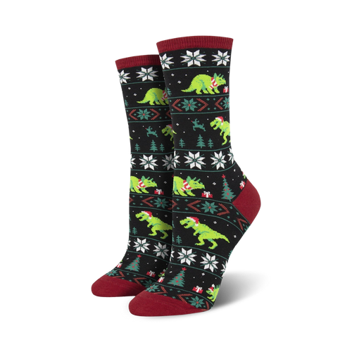 Crew socks in black and green featuring a Fair Isle pattern with T-Rex dinosaurs wearing Santa hats.