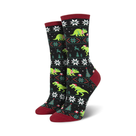 black crew socks with all-over pattern of cartoonish green dinosaurs wearing red and white santa hats amid xmas trees and presents.   