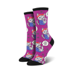 Lifestyle shot showing the purple version of the 'We Can Mew It' socks on a model's feet.