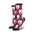 A pair of women's crew socks in burgundy featuring a repeating pattern of West Highland White Terrier faces. 