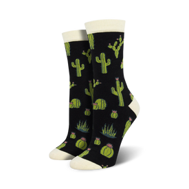 black crew socks with a pattern of cacti and flowers in pink and yellow.   