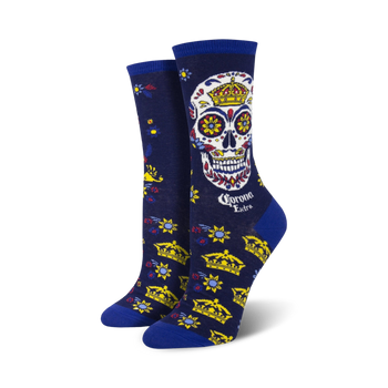 blue crew socks with yellow, red, and green flowers, gold crowns, and a large skull in the center for women celebrating day of the dead  