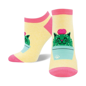 yellow ankle socks with pink toe, heel, and cuff feature a smiling cat wearing a cactus costume.  