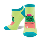 Lifestyle shot of Kitty Cactus socks on a person's feet. Shows the socks' fit and style.