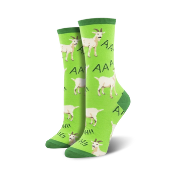 whimsical green crew socks feature cartoon goats standing on hind legs with open mouths, screaming. women's size.   