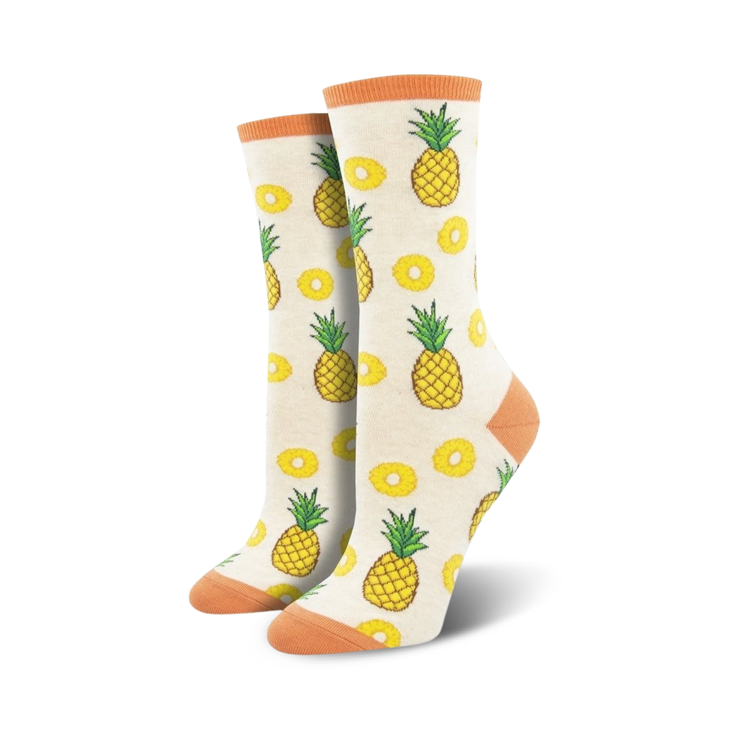 Pair of cream crew socks with orange cuffs, featuring a whimsical pineapple and pineapple slice pattern.