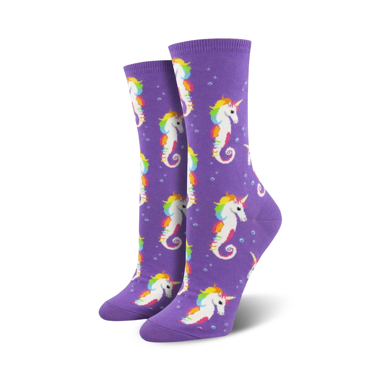Pair of women's crew socks. Purple background with repeating pattern of rainbow-maned seahorse unicorns and small bubbles.