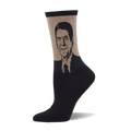 Crew sock with a black foot and a beige upper featuring a detailed, smiling portrait of Ronald Reagan in a suit and tie.