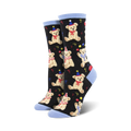 A pair of black crew socks with a pattern of light brown teddy bears wearing party hats.  Red and yellow balloons and confetti are scattered amongst the bears. The socks have light blue cuffs.