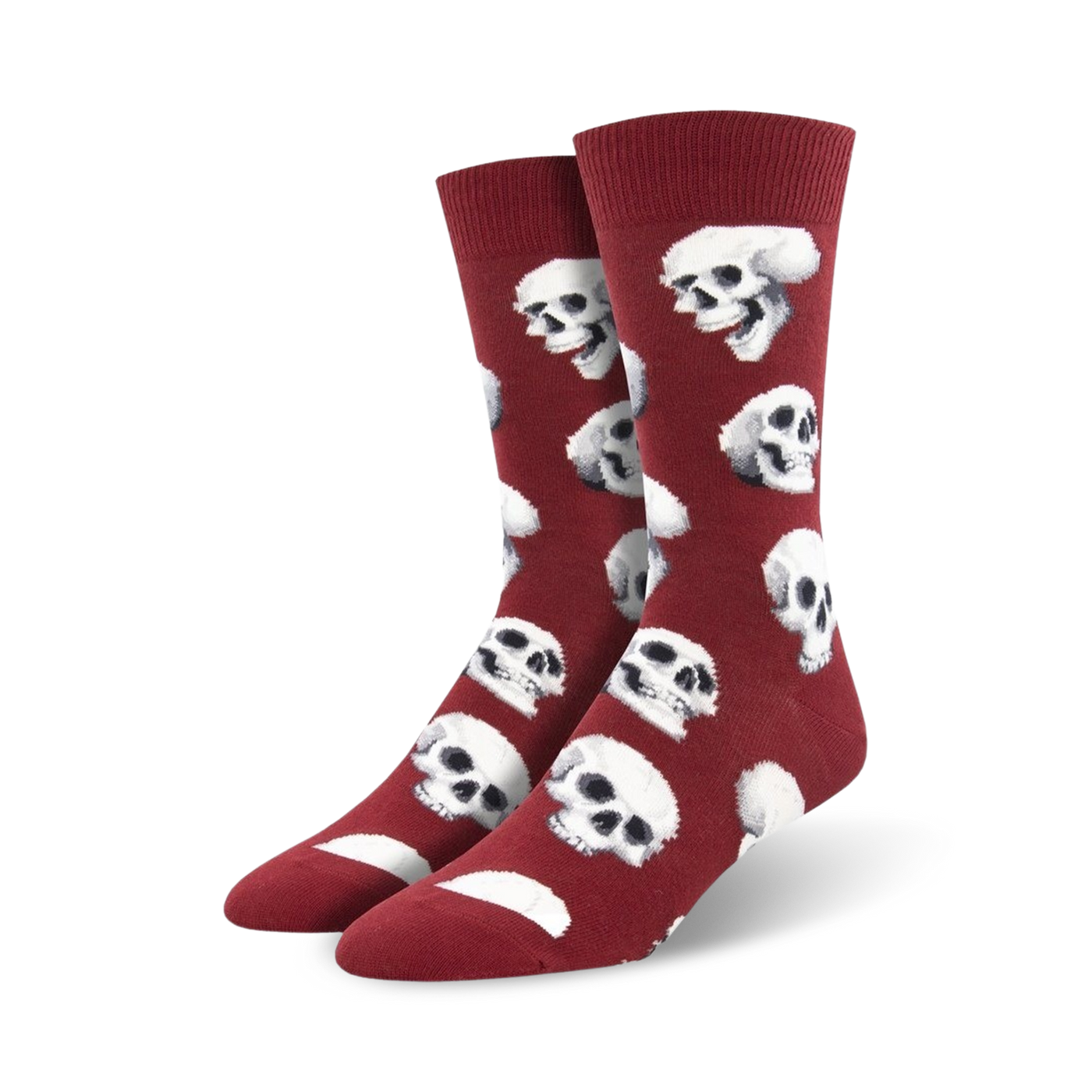 Pair of crimson red crew socks featuring a repeating pattern of white skulls.  A fun and slightly spooky design.