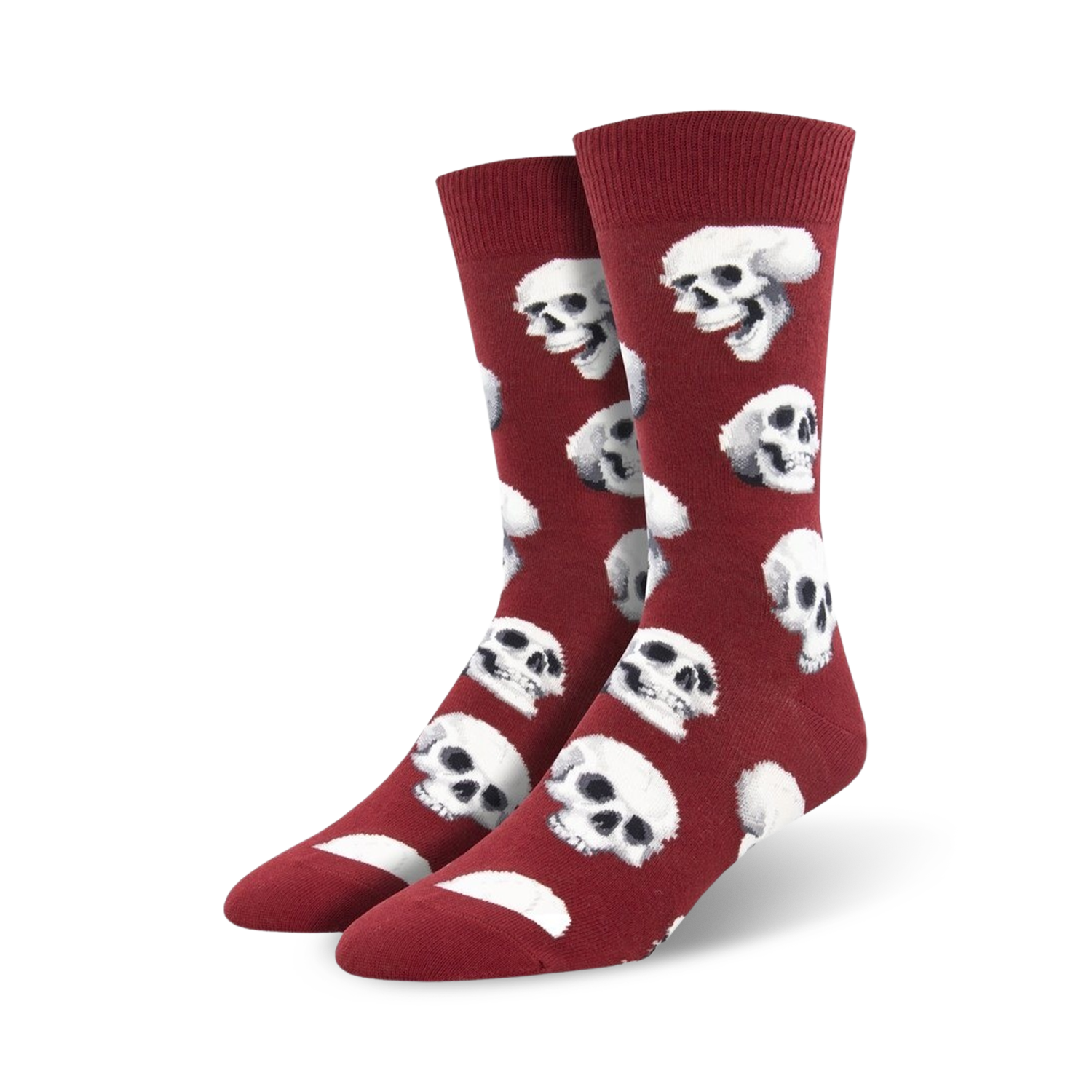 Pair of crimson red crew socks featuring a repeating pattern of white skulls.  A fun and slightly spooky design.